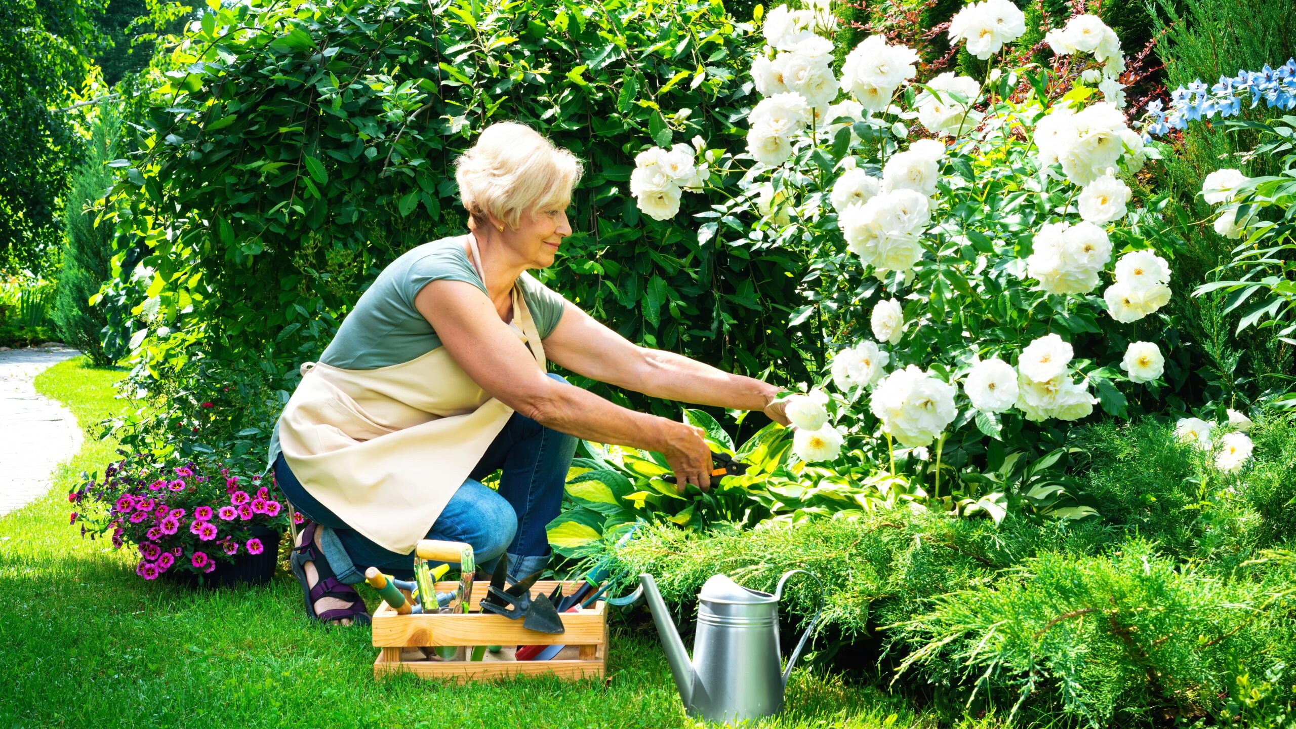 Senior woman gardening in assisted living in Macomb County.
